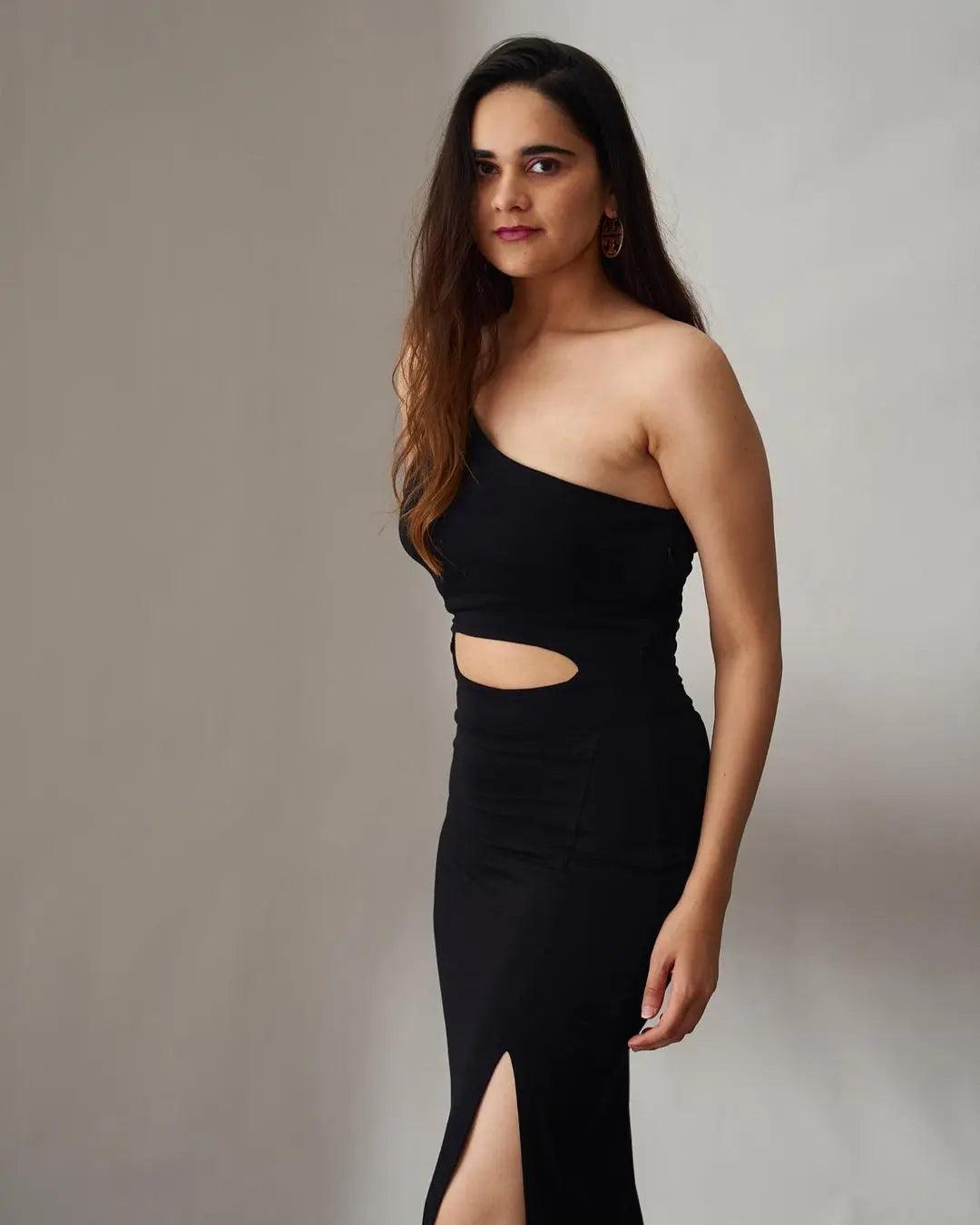 Beautiful one shoulder black dress for women featuring a stylish cutout and side slit