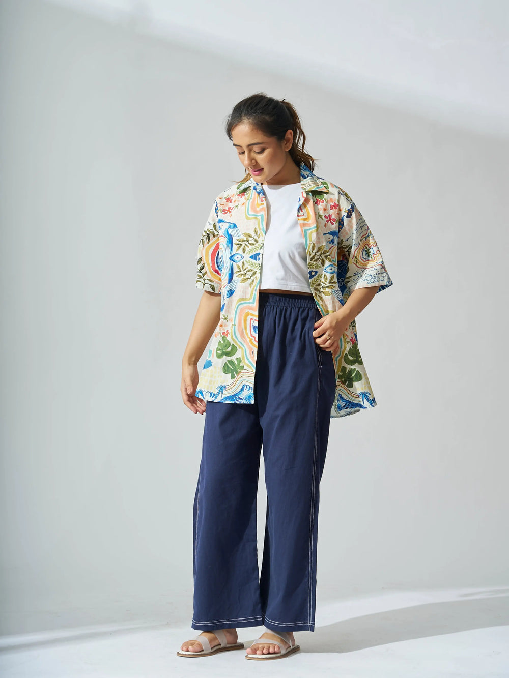 Colorful oversized cotton poplin shirt for women styled with casual pants and sandals