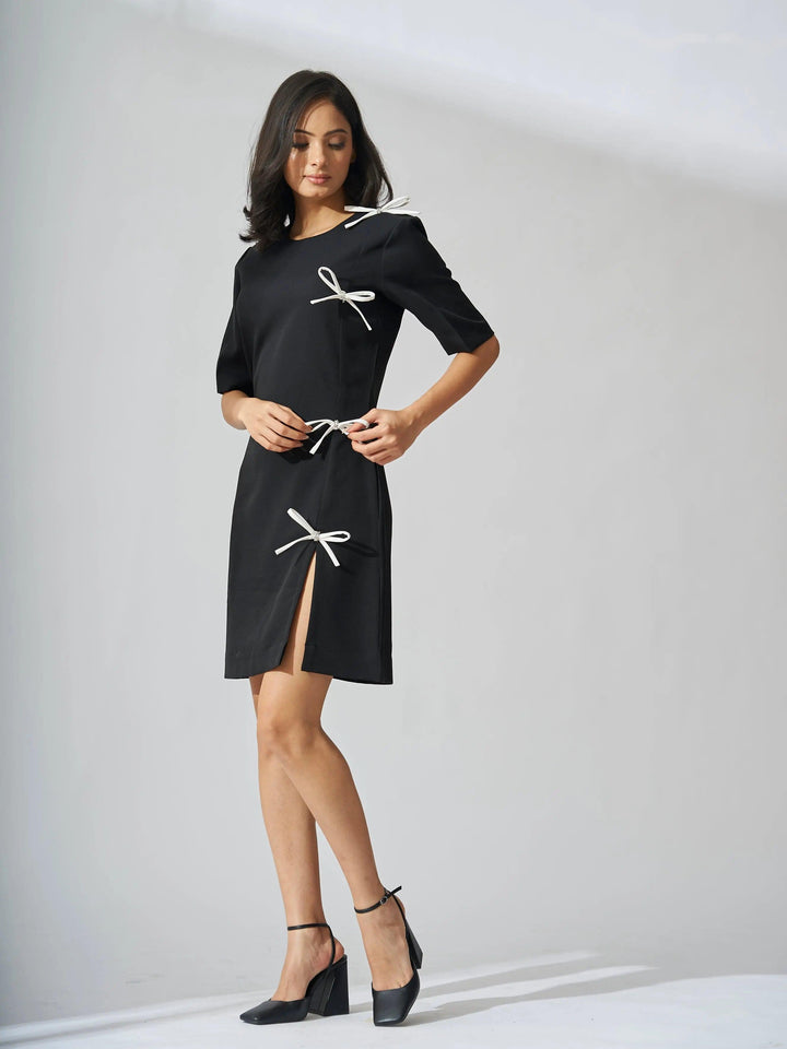 Elegant black rhinestone bow shift dress with stylish bows and a flattering silhouette