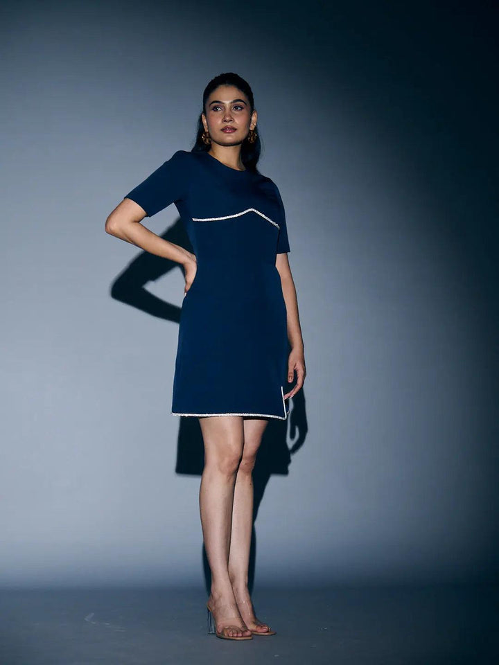 Risate rhinestone lace mini dress in navy blue featuring elegant detailing and short sleeves