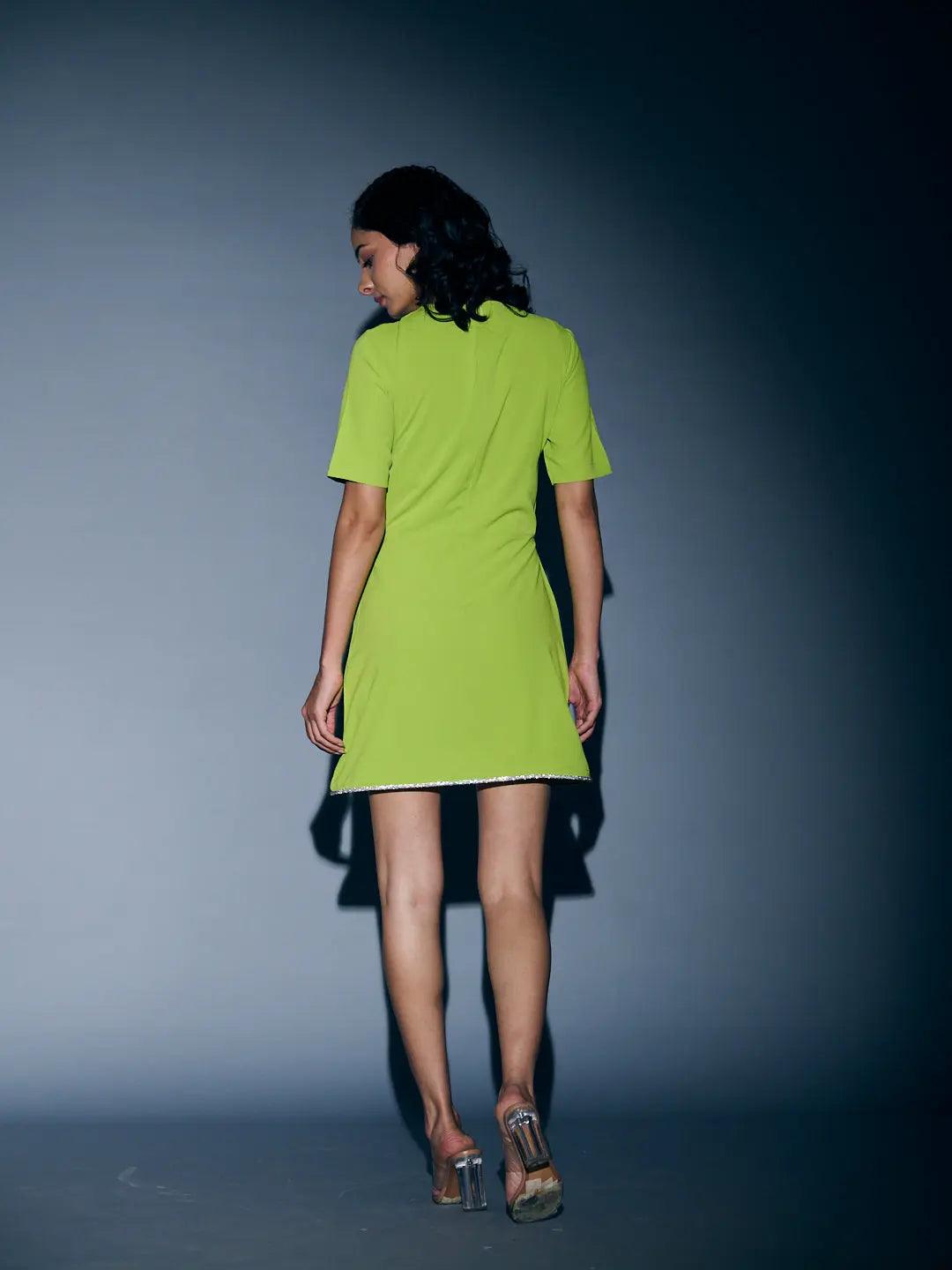 Back view of a vibrant green rhinestone lace mini dress by Risate, showcasing a stylish and youthful design.