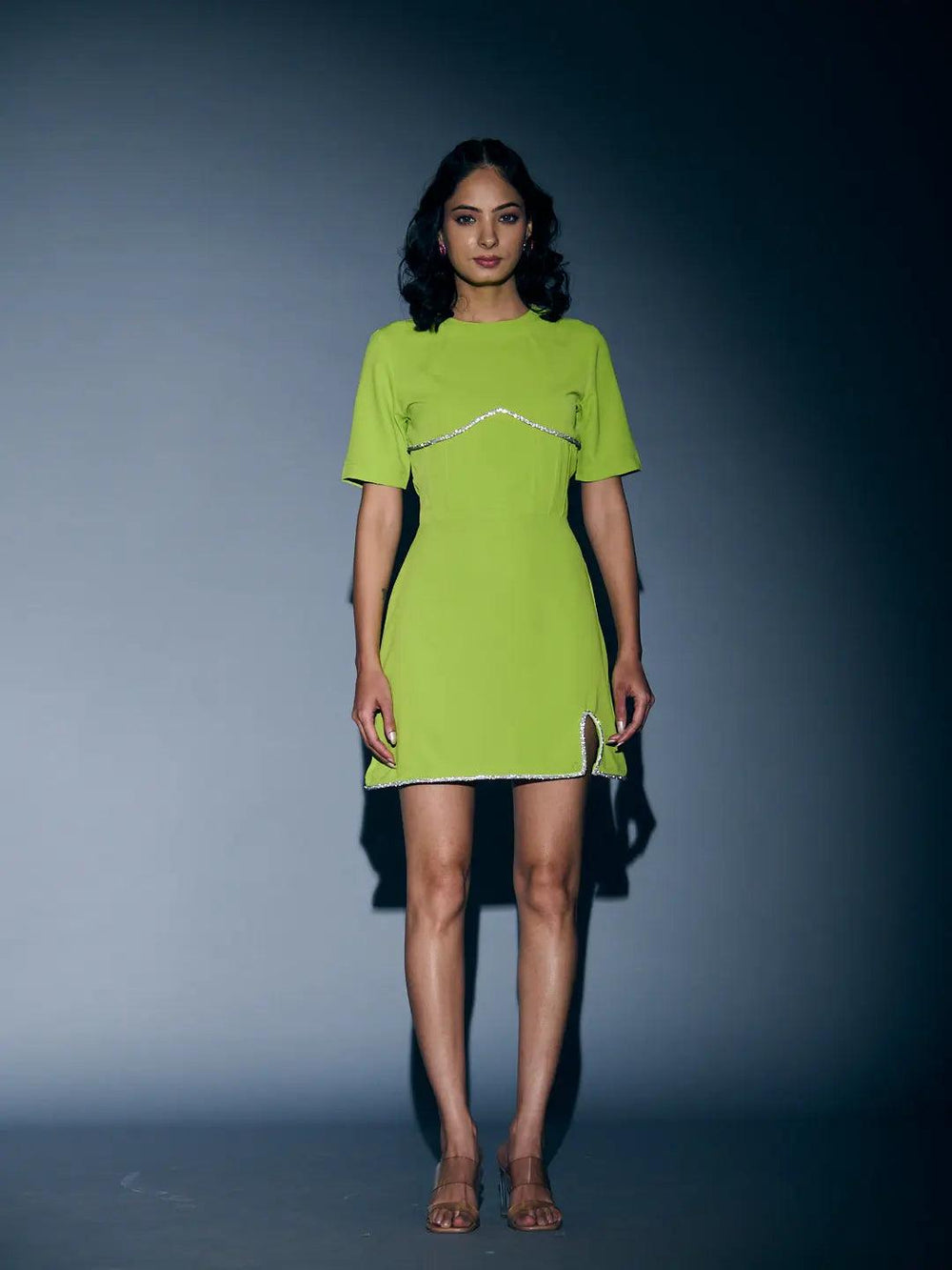 Bright green Risate rhinestone lace mini dress with short sleeves and side slit detail