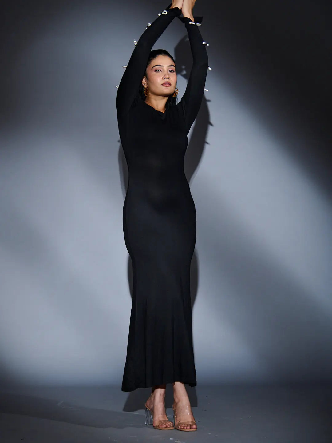 Elegant Risate rhinestone sleeve maxi dress in black, perfect for evening events