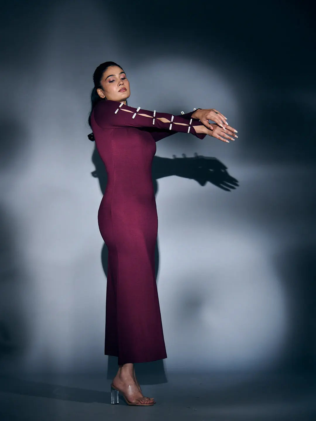 Risate rhinestone sleeve maxi dress in burgundy, featuring elegant long sleeves and a fitted silhouette