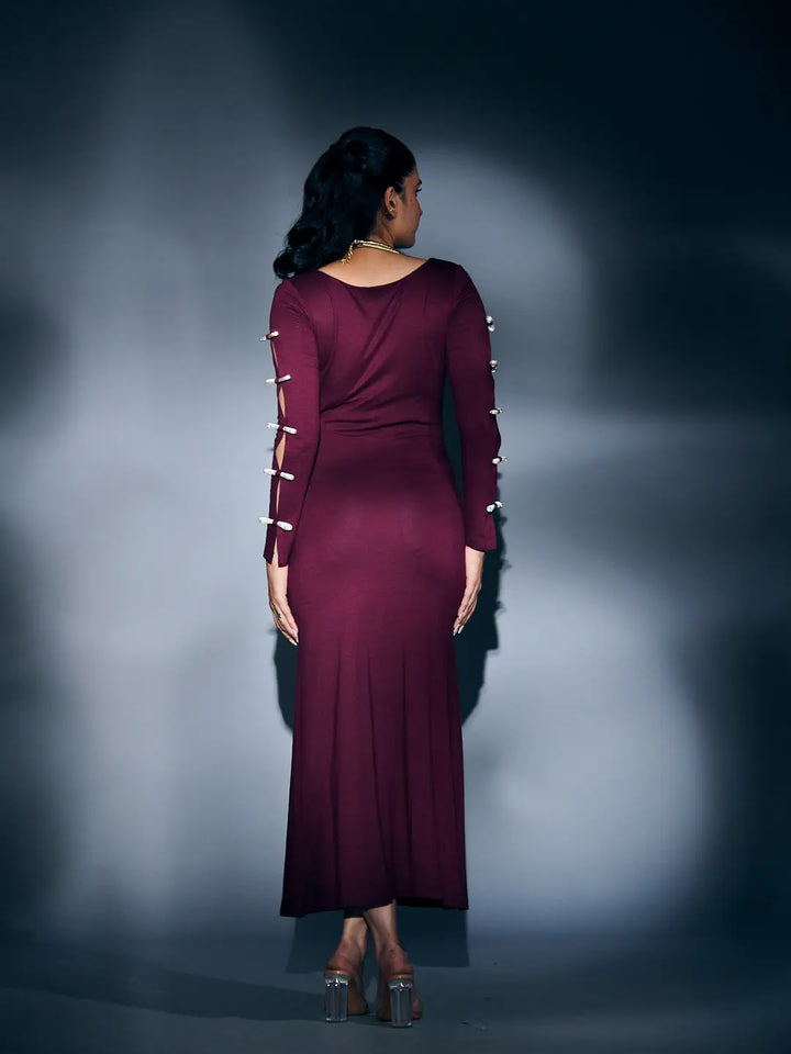 Back view of a Risate rhinestone sleeve maxi dress in burgundy, featuring stylish long sleeves