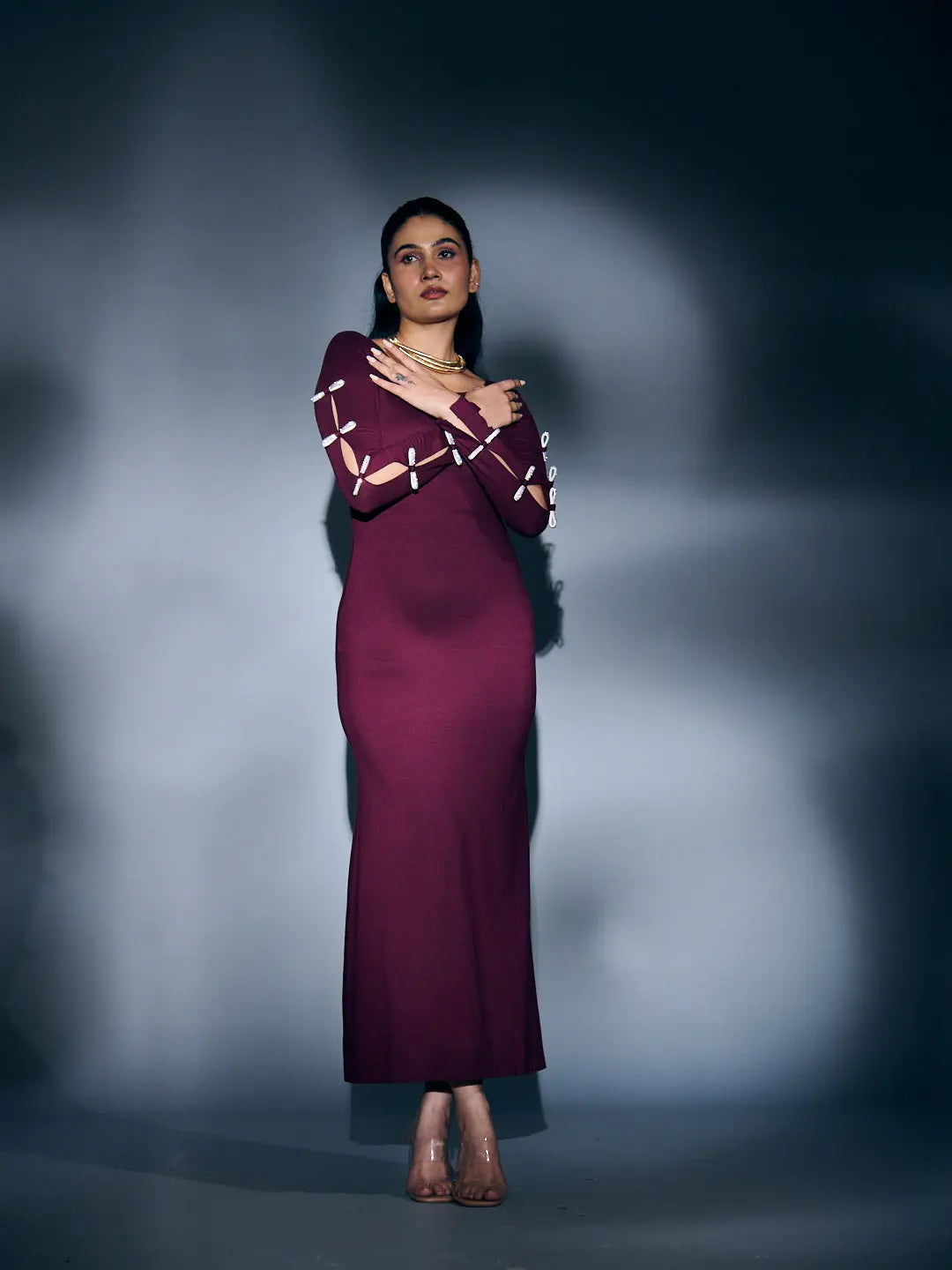Risate rhinestone sleeve maxi dress in burgundy for elegant evening wear.