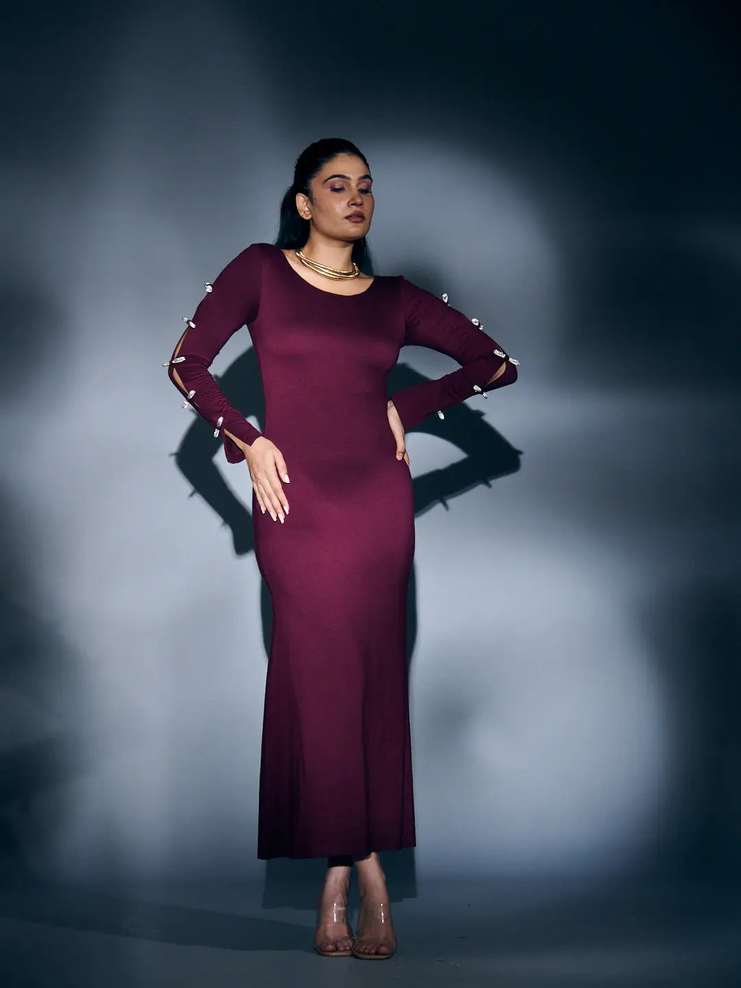 Risate burgundy rhinestone sleeve maxi dress with elegant cutout details for a stylish look