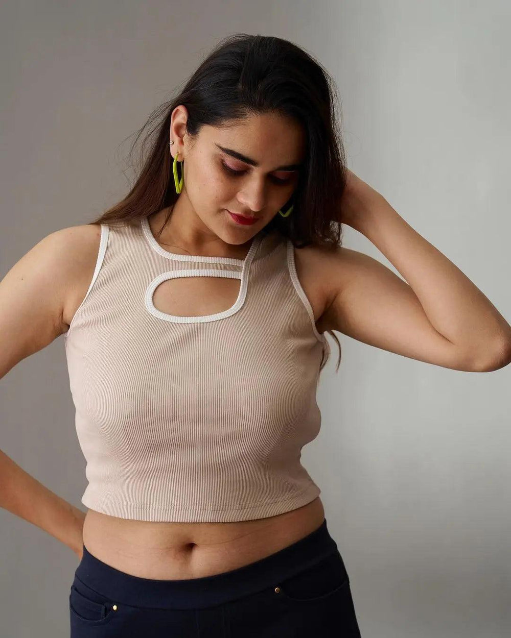 Risate ribbed crop top for women in beige with stylish cut-out design and contrasting trim
