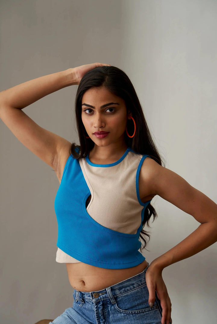 Trendy Risate ribbed crop top for women in blue and beige with a stylish cutout design