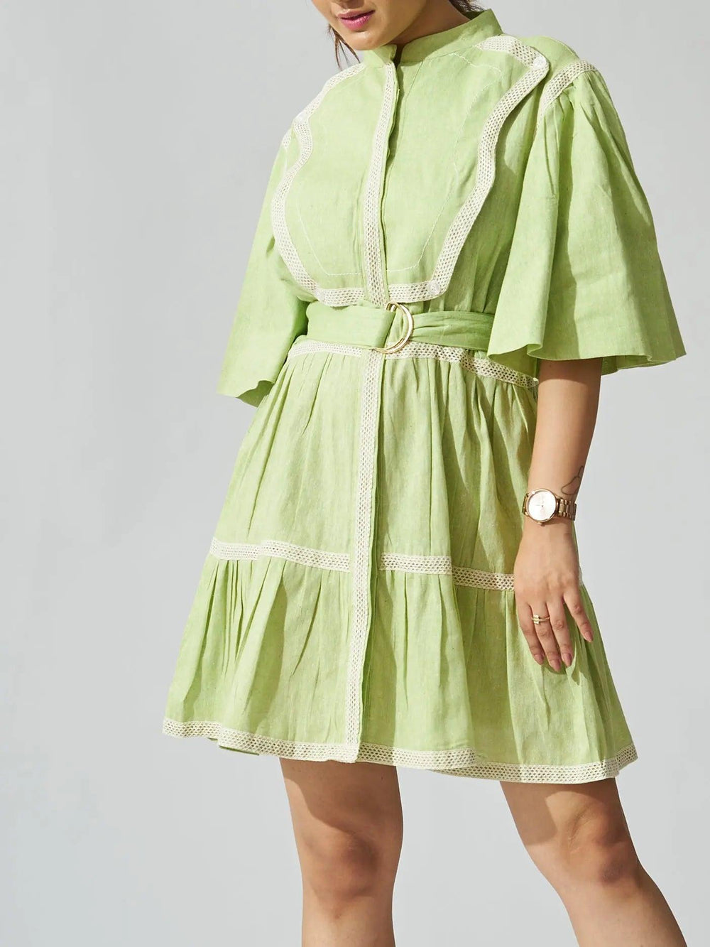 Risate ruffle linen blend mini dress in light green with decorative trim and belted waist