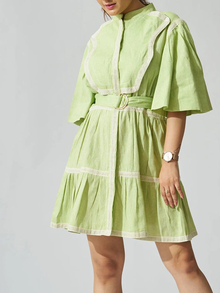 Risate ruffle linen blend mini dress in light green with decorative trim and belted waist