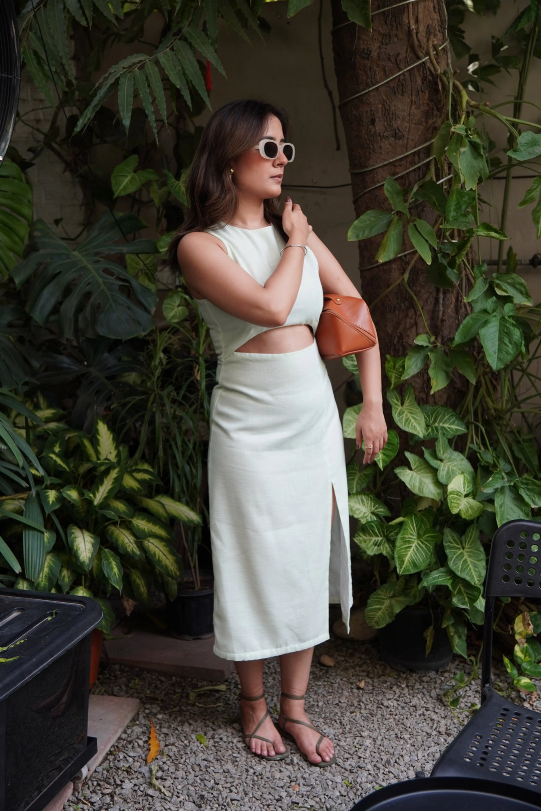 Risate sage cut out dress featuring a side slit and stylish design for casual outings