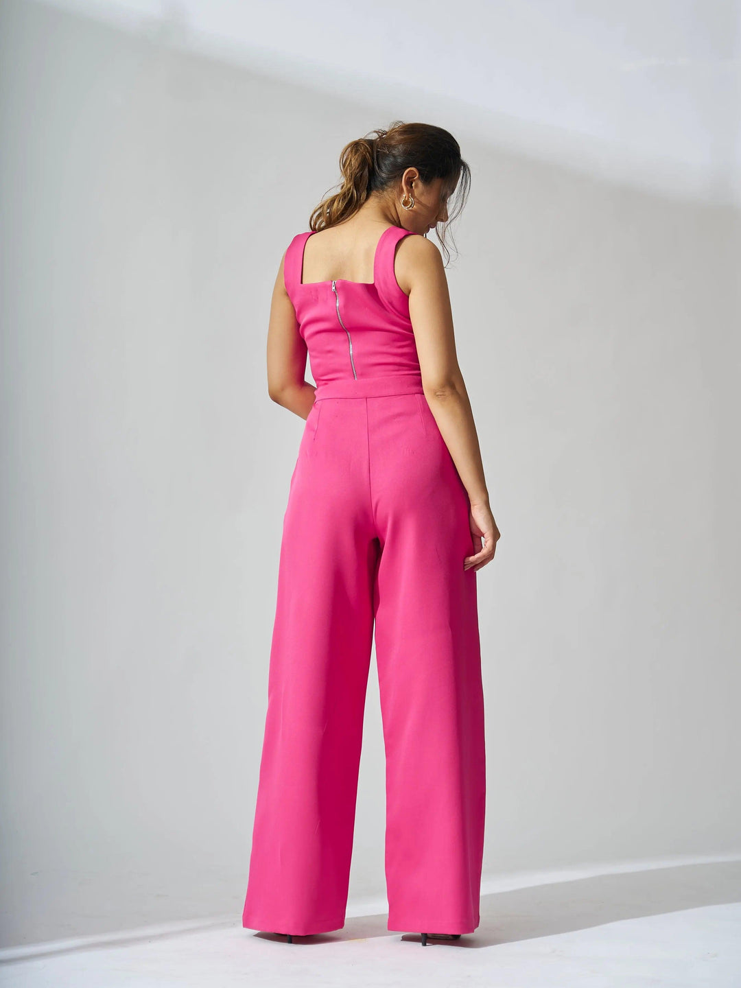 Risate sleeveless corset top and pants set in vibrant pink with stylish wide leg pants