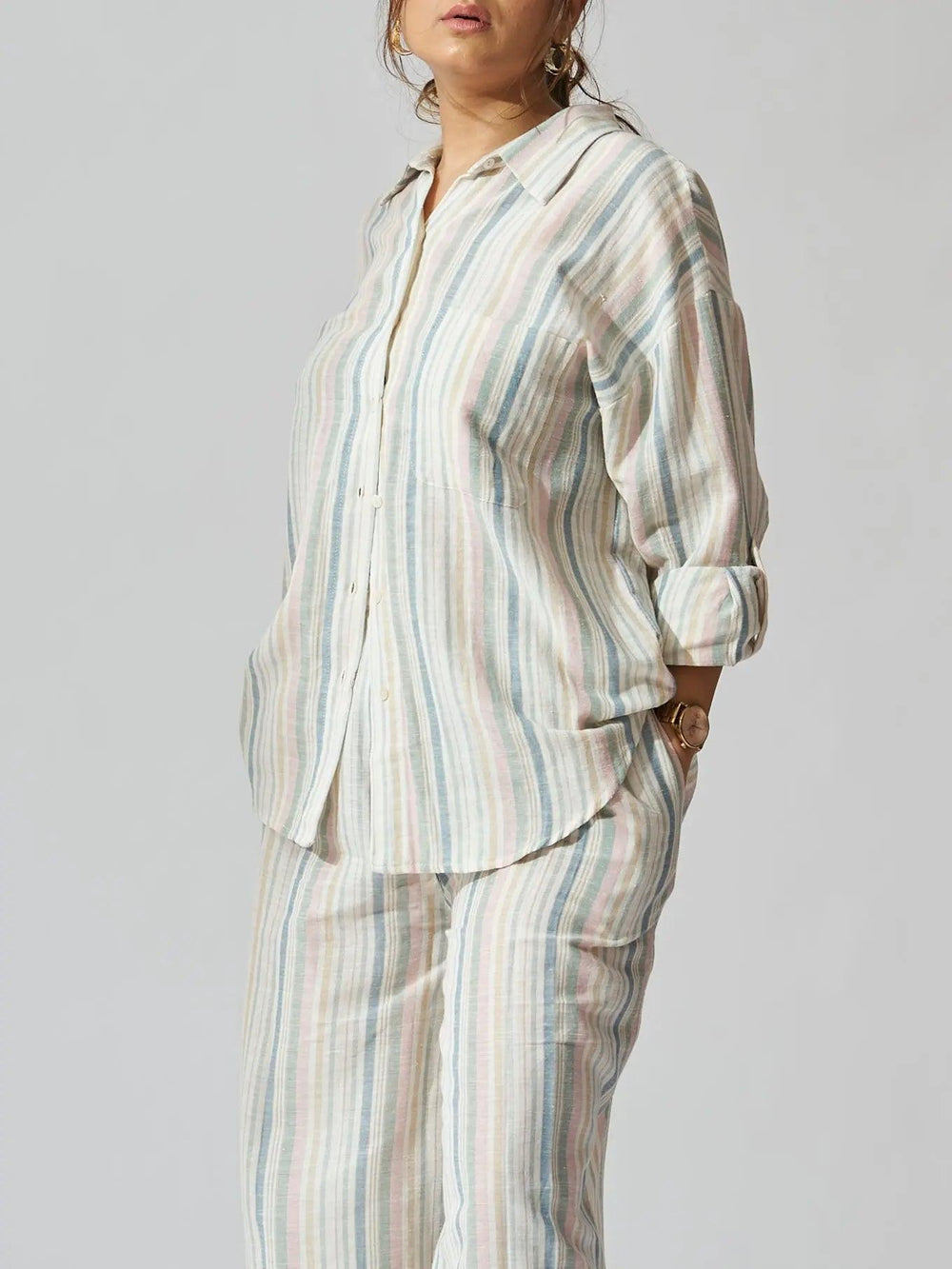 Risate sunset striped linen shirt and flared pants set in soft pastel colors for casual elegance