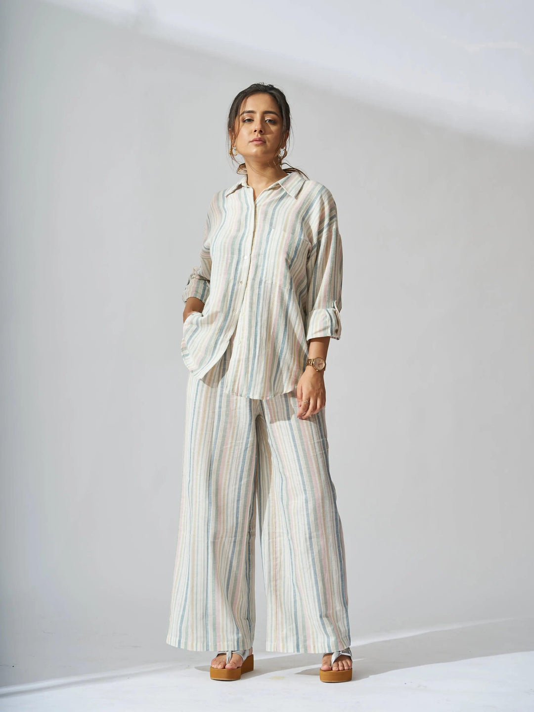Risate sunset striped linen shirt and flared pants set in a relaxed style for casual summer outings