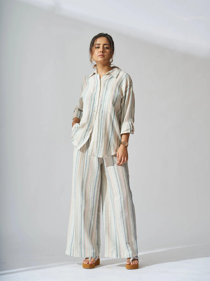 Risate sunset striped linen shirt and flared pants set in a relaxed style for casual summer outings