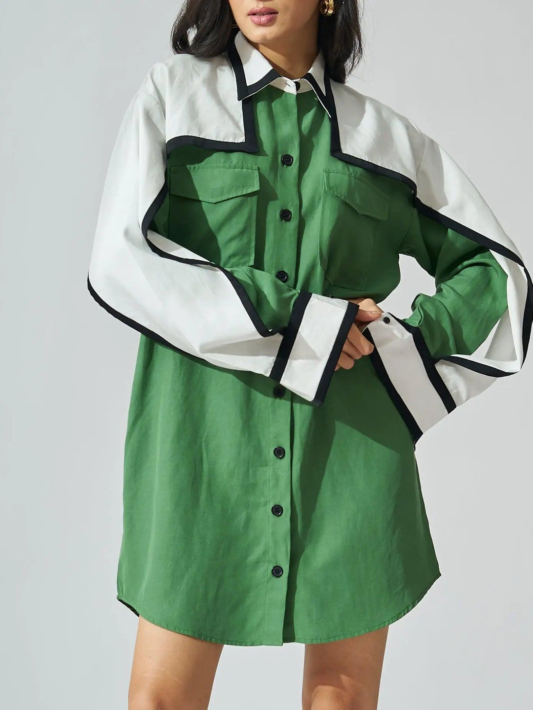 Risate Tencel linen mini shirt dress in green with contrast white detailing for a stylish look