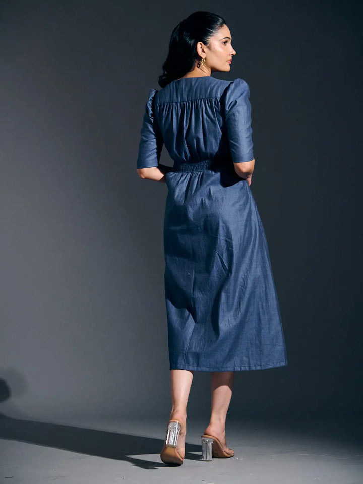 Risate twist detail maxi dress in dark denim with a flattering back design and elbow-length sleeves
