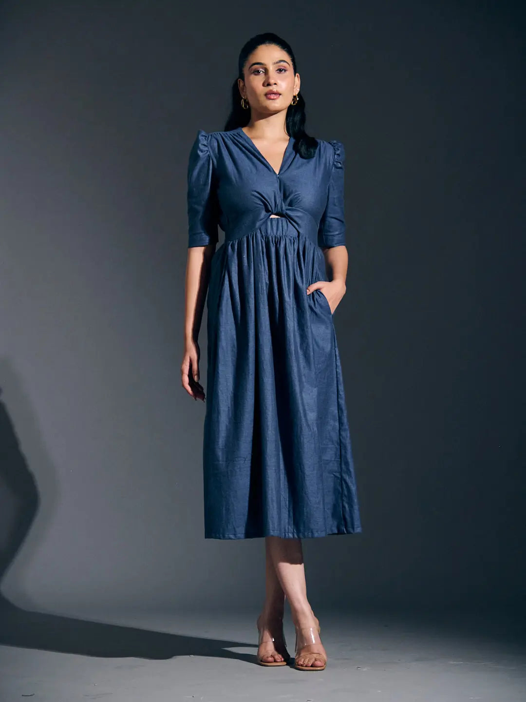 Risate twist detail maxi dress in navy with puff sleeves and a flattering waist tie