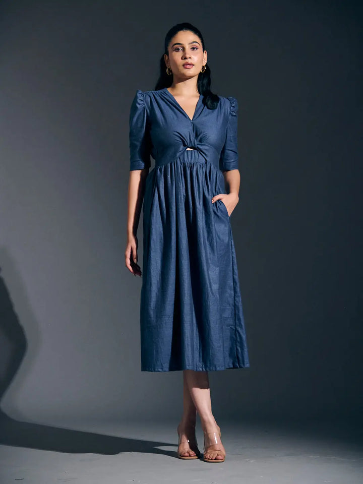 Risate twist detail maxi dress in navy with puff sleeves and a flattering waist tie