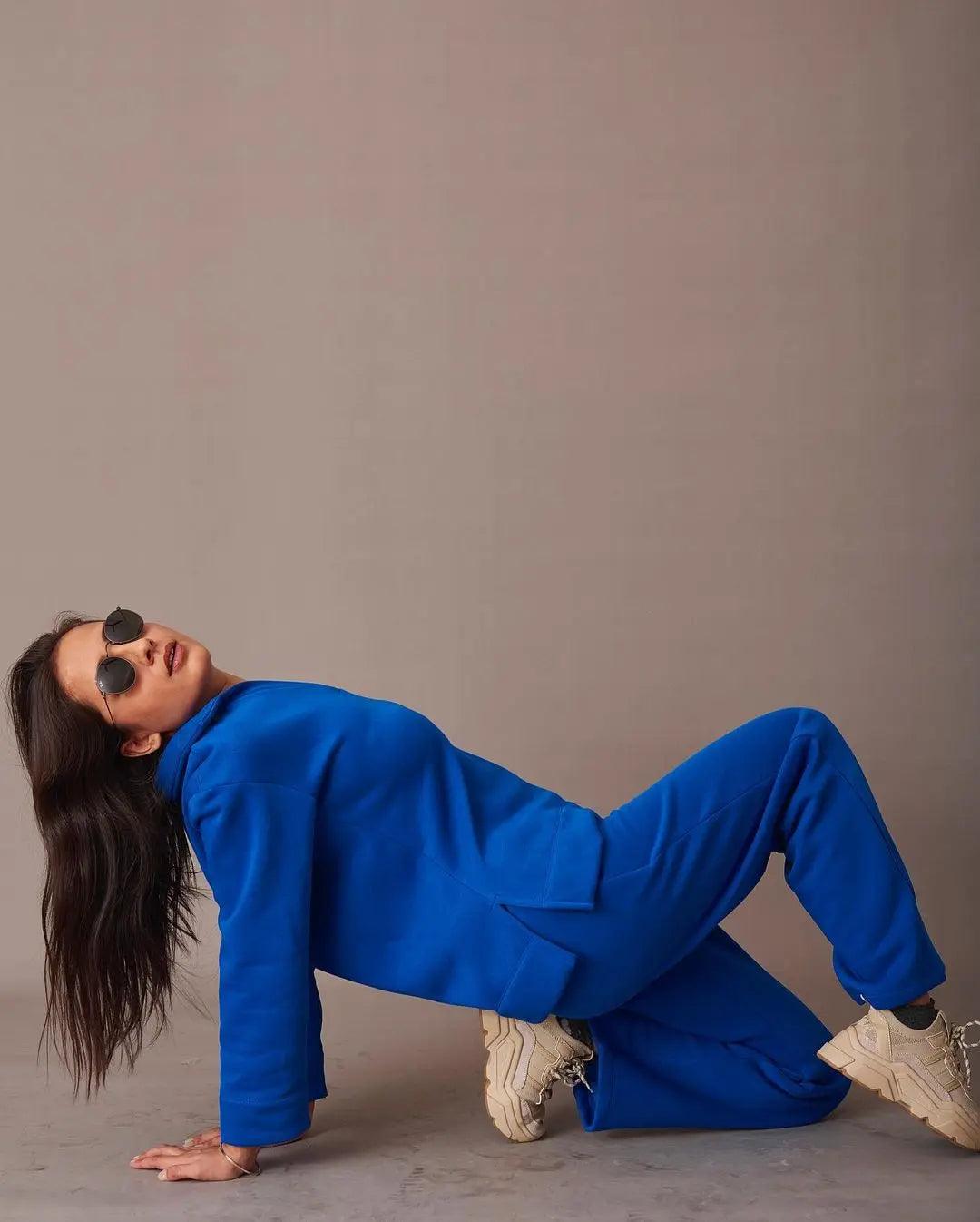 Risate blue co-ord set with comfortable fabric worn in a stylish pose, featuring an ugly christmas pullover