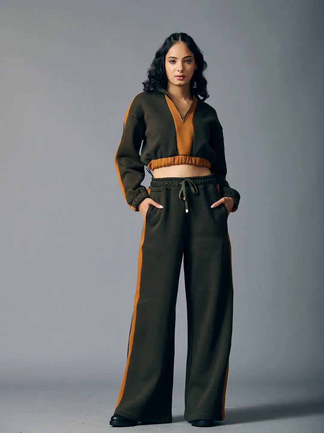 Risate urban chill set for women in olive green with contrasting orange accents and relaxed fit style