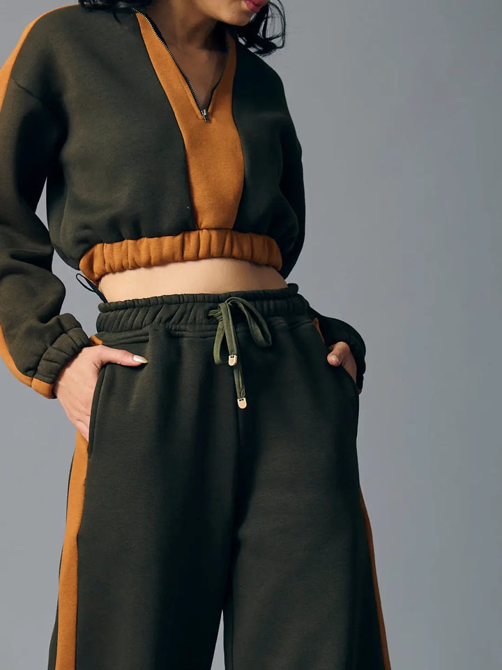 Risate urban chill set for women featuring a cropped top and matching jogger pants in olive green and brown