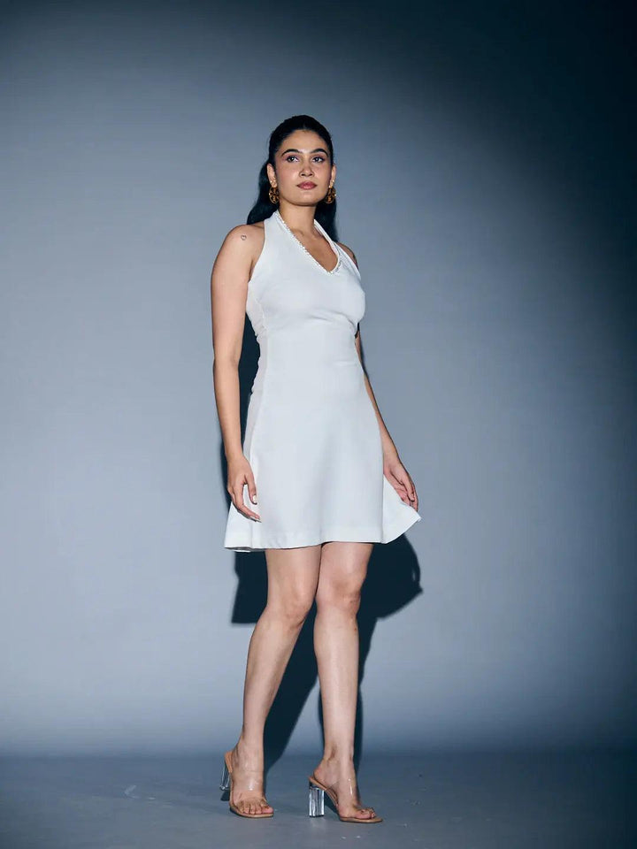 Risate v-neck cocktail mini dress in white, perfect for stylish evening outings and parties