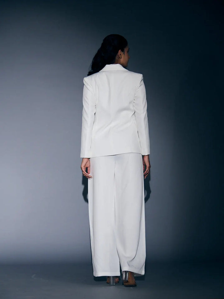 Risate white blazer and pants set for women with a sleek and stylish design from the back