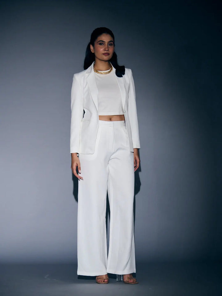 Stylish Risate white blazer and pants set for women with a cropped top, perfect for chic occasions