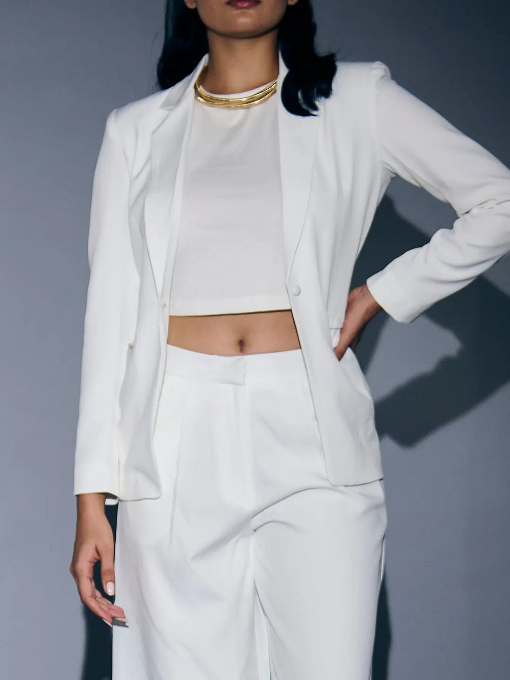 Risate white blazer and pants set for women with cropped top and elegant style
