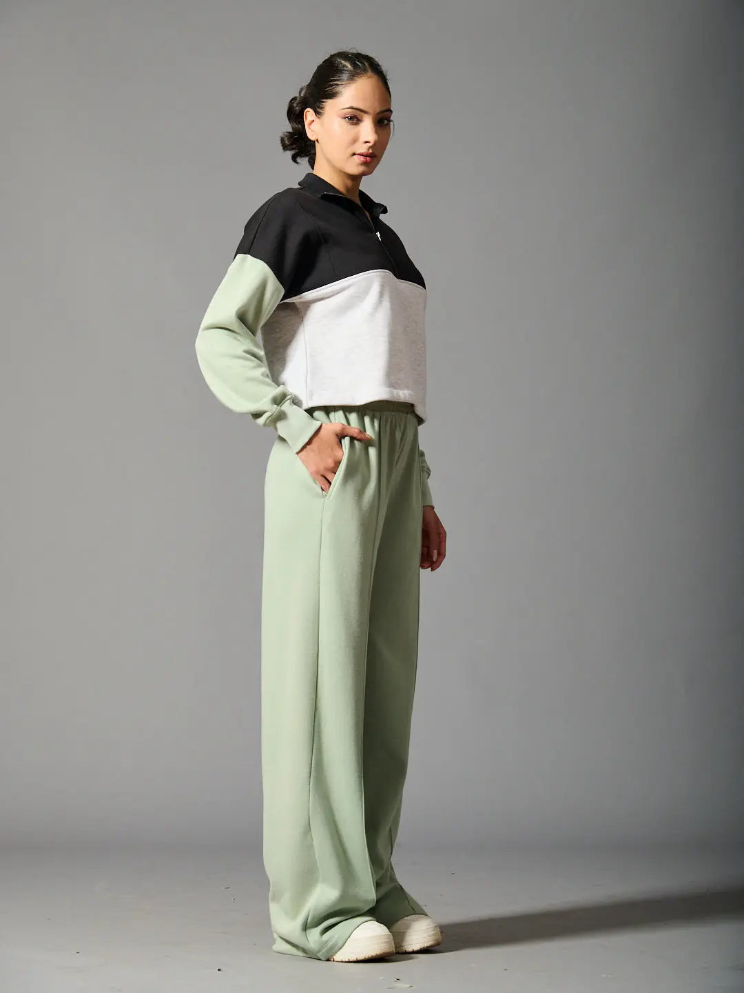 Willows coord set for women featuring a stylish black and gray cropped top with green wide-leg pants