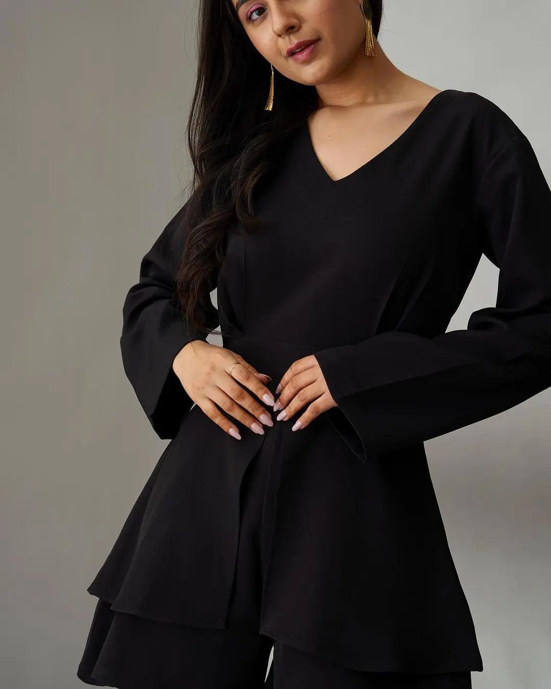 Stylish women's black jumpsuit with a V-neck and layered design for a chic look