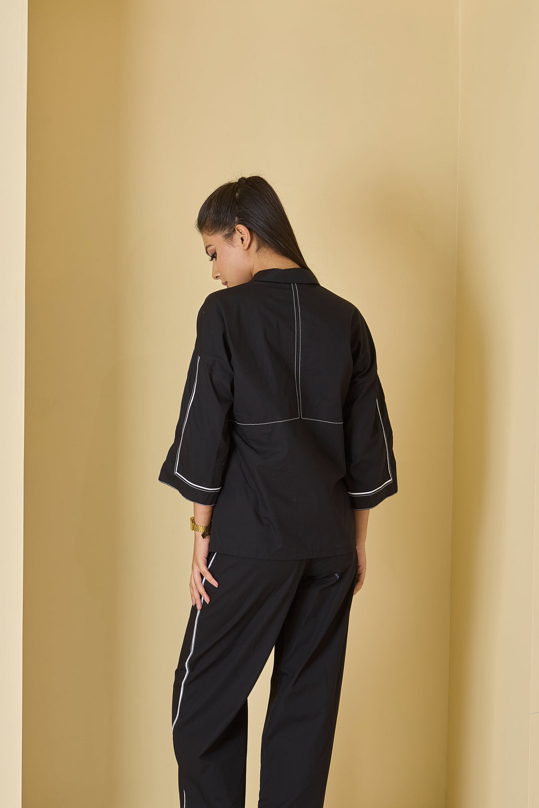 Stylish women's black piped western set with a modern design and relaxed fit