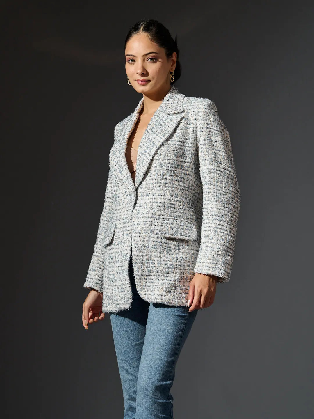 Risate women's British tweed blazer with a stylish design and front pockets worn with jeans