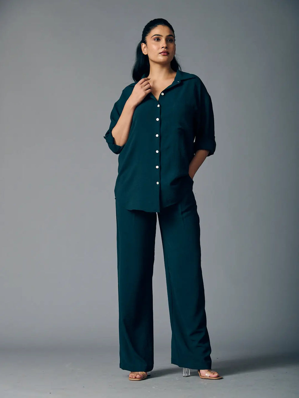 Women's classic shirt and pants set in dark green with a relaxed fit and button details