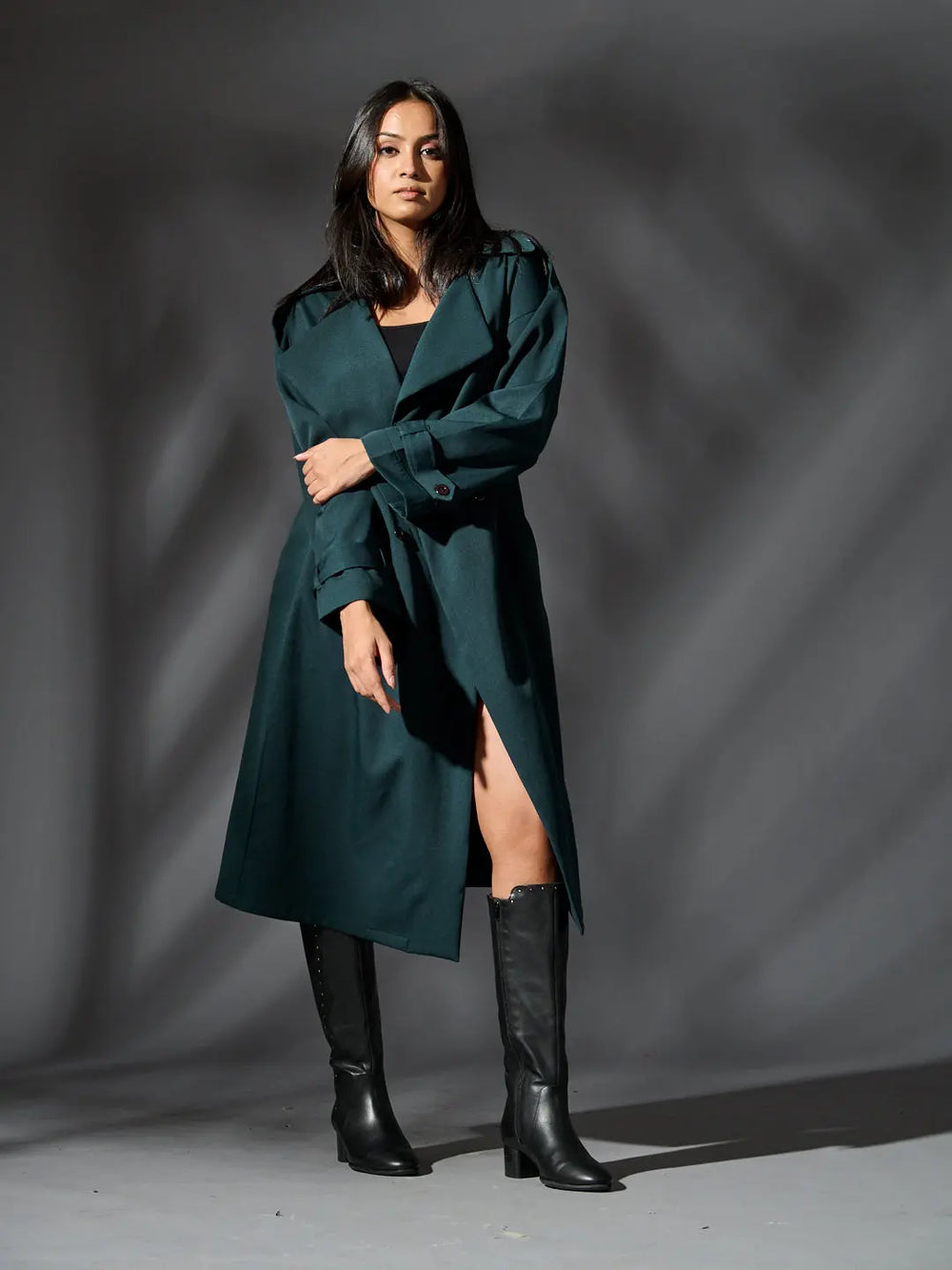 Risate women's classic trench coat in teal with a stylish design and side slit for contemporary fashion