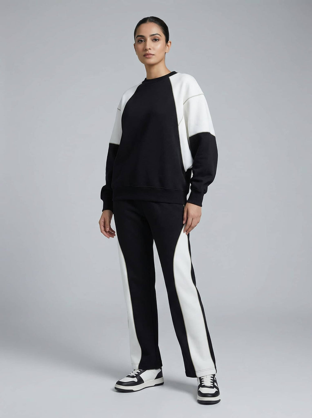 Risate women's co-ord set featuring a black and white sweatshirt and matching pants for a trendy casual look