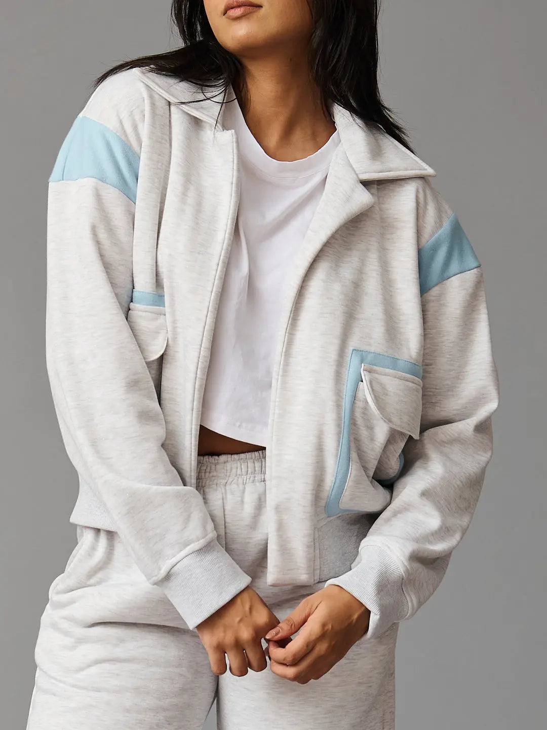 Risate women's co-ord set featuring a stylish gray jacket with blue accents and matching joggers