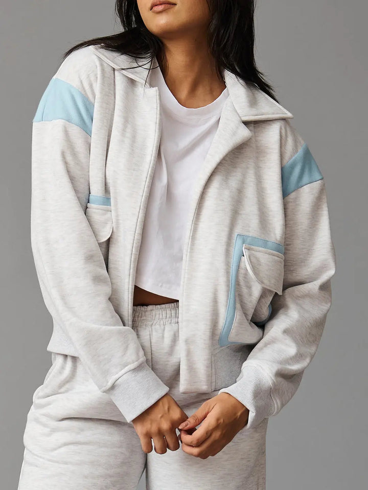 Risate women's co-ord set featuring a stylish gray jacket with blue accents and matching joggers