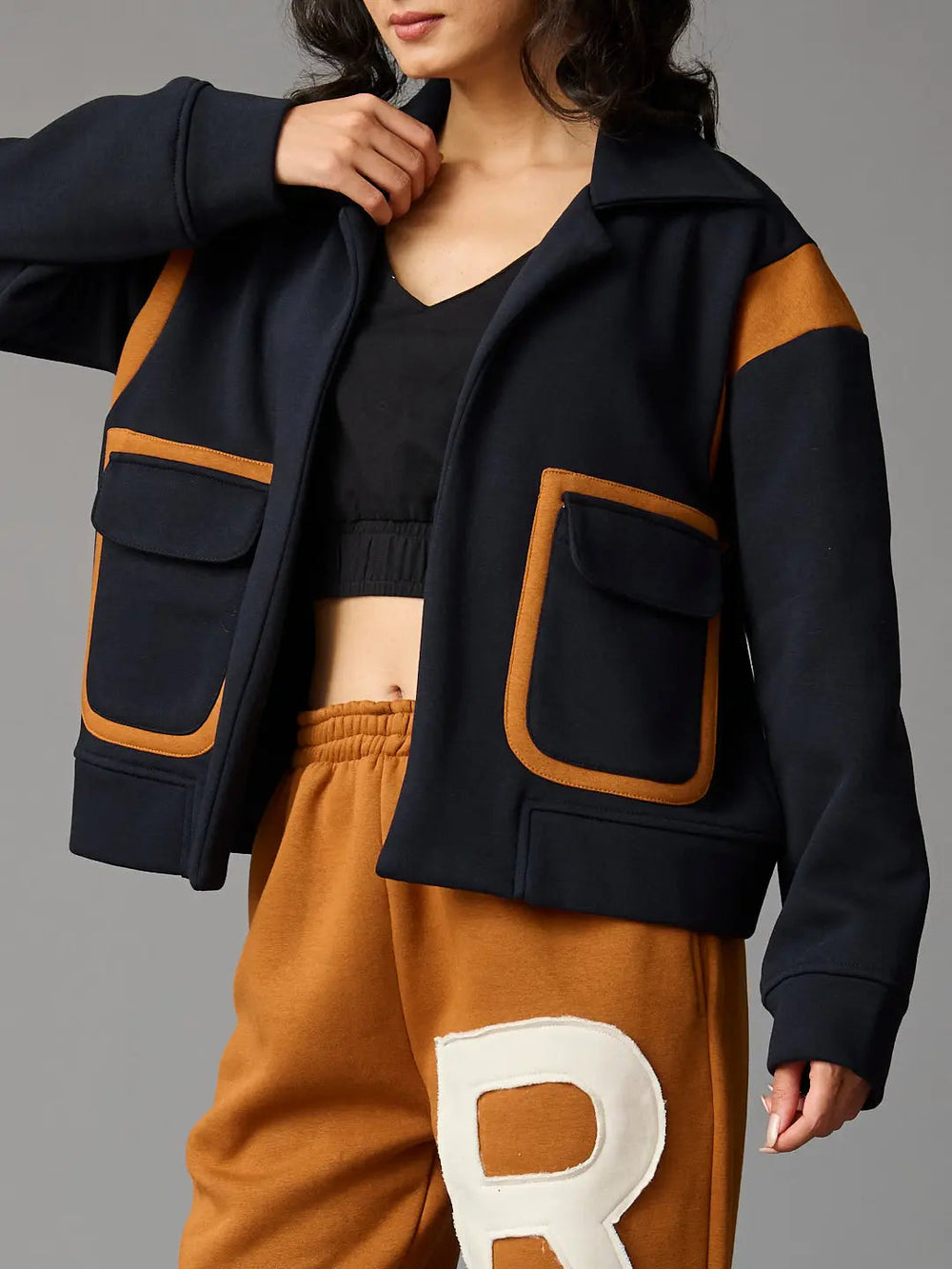 Risate women's co-ord set featuring a stylish jacket with pockets and matching pants for a trendy look