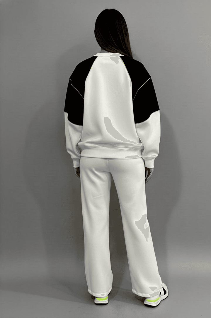 Risate women's co-ord set in white and black, featuring a relaxed fit and stylish design