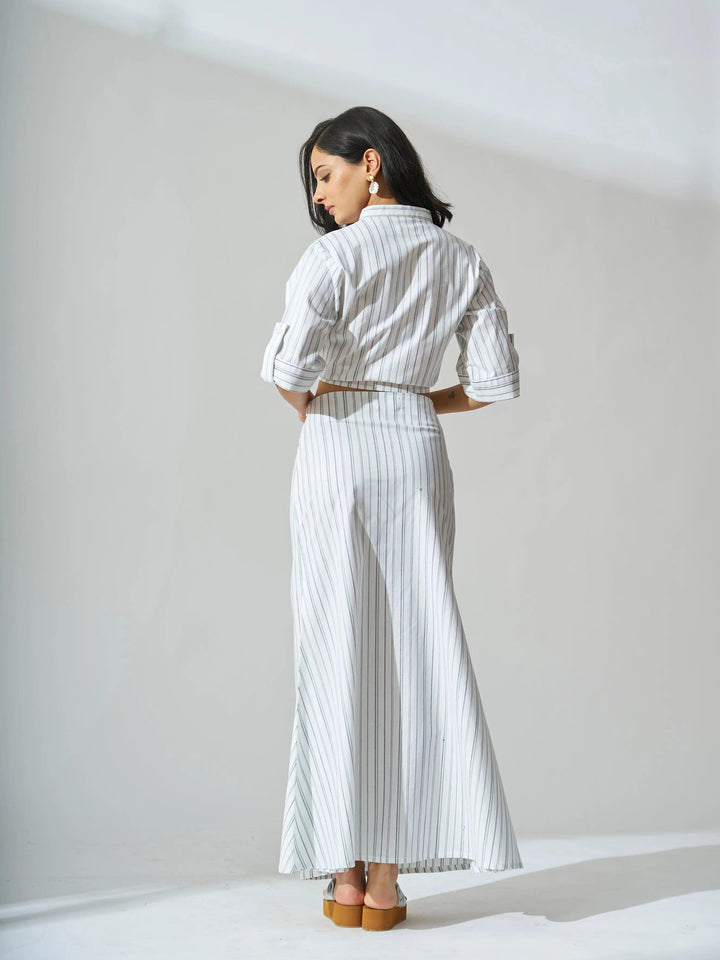 Back view of women's cotton striped co-ord set with a long skirt and button-up top