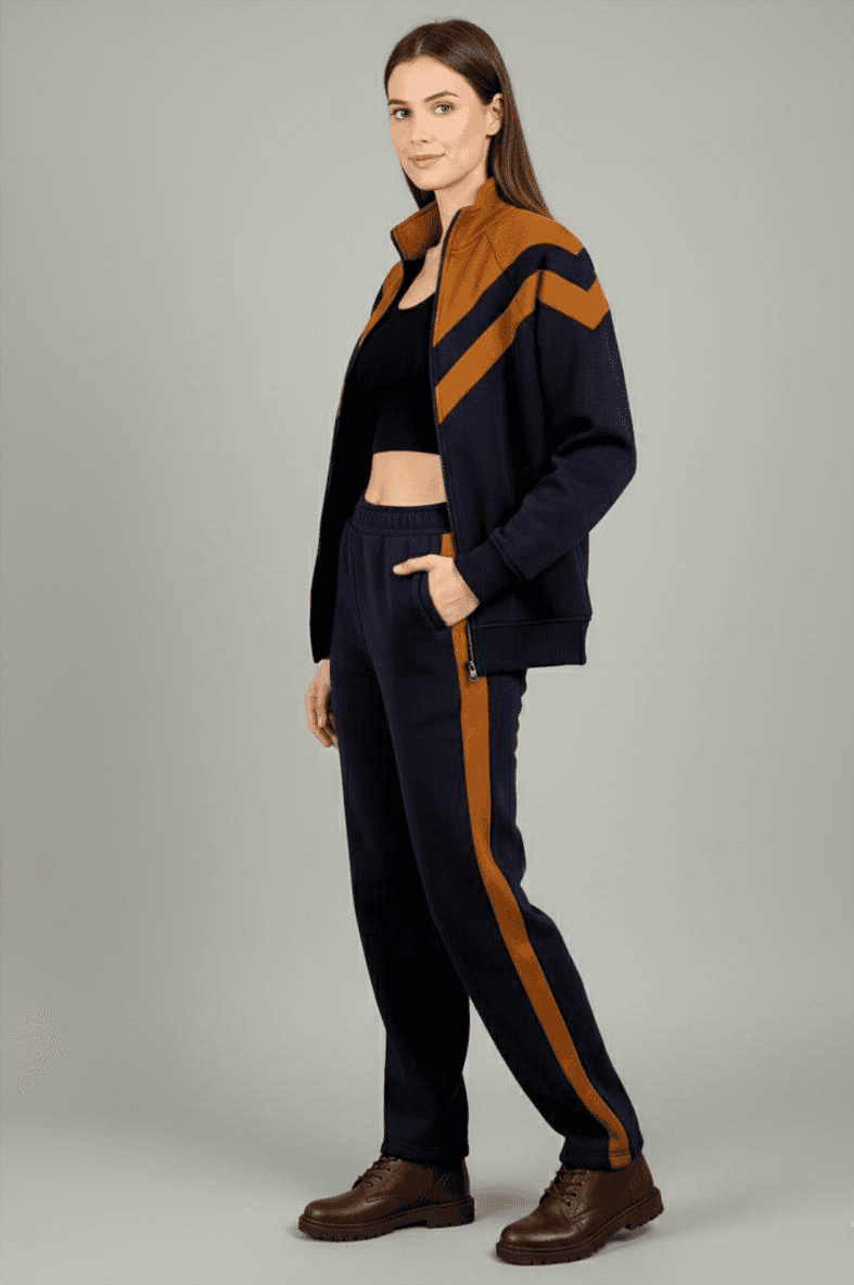 Risate women's fleece co-ord set featuring a zip-up jacket and matching pants in navy and orange