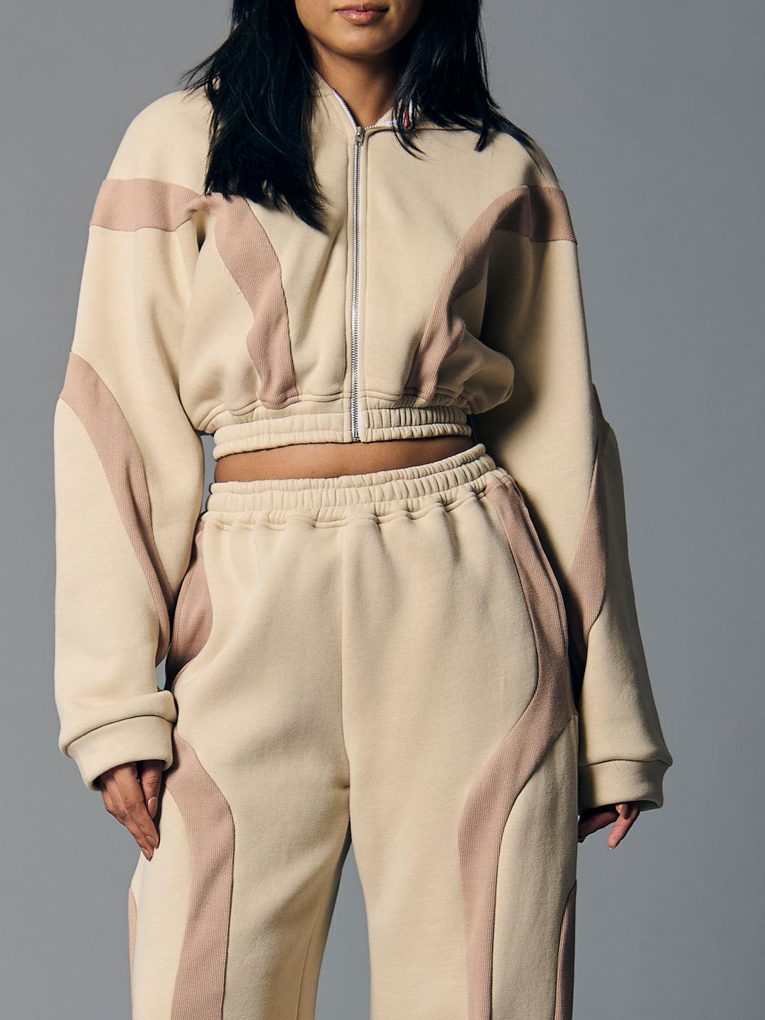 Risate women's fleece coord set featuring a cropped zip-up top and matching elastic waist pants in a soft design