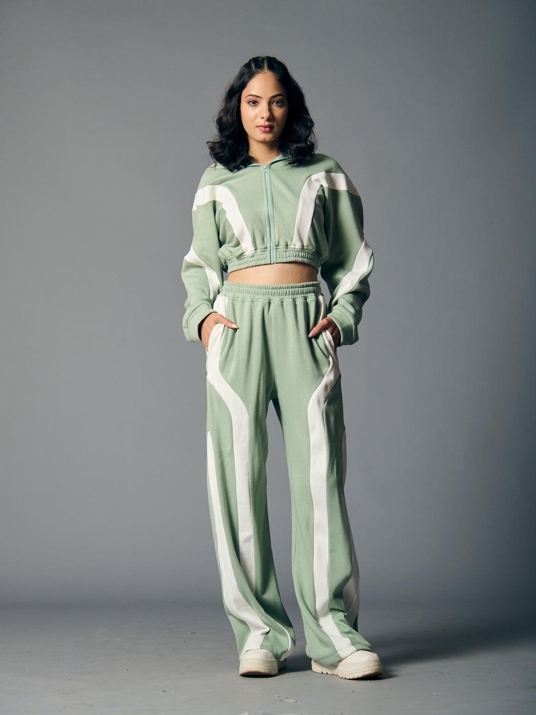 Trendy women's fleece coord set in green with white stripes, perfect for casual outings