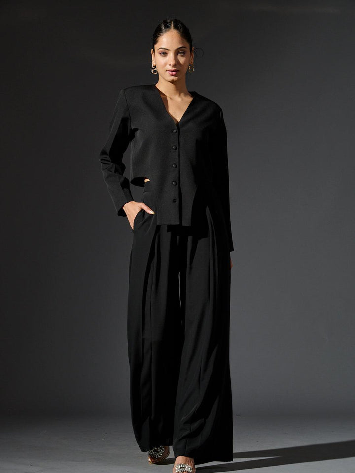 Risate women's full sleeves waistcoat set in black with stylish button front and chic wide-leg pants