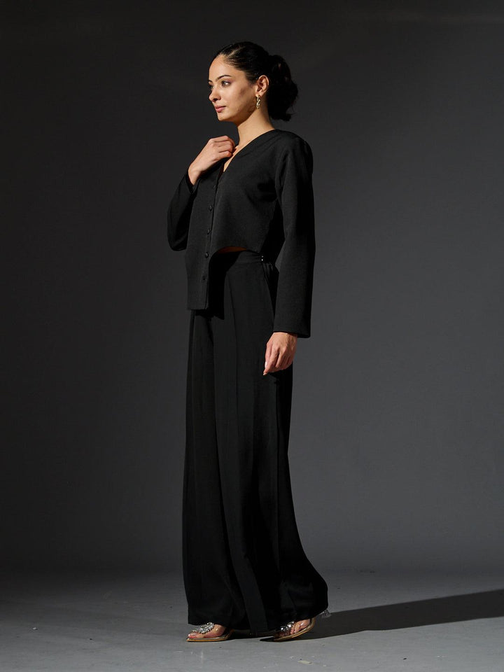 Risate women's full sleeves waistcoat set in black featuring a stylish cropped waistcoat and wide-leg pants