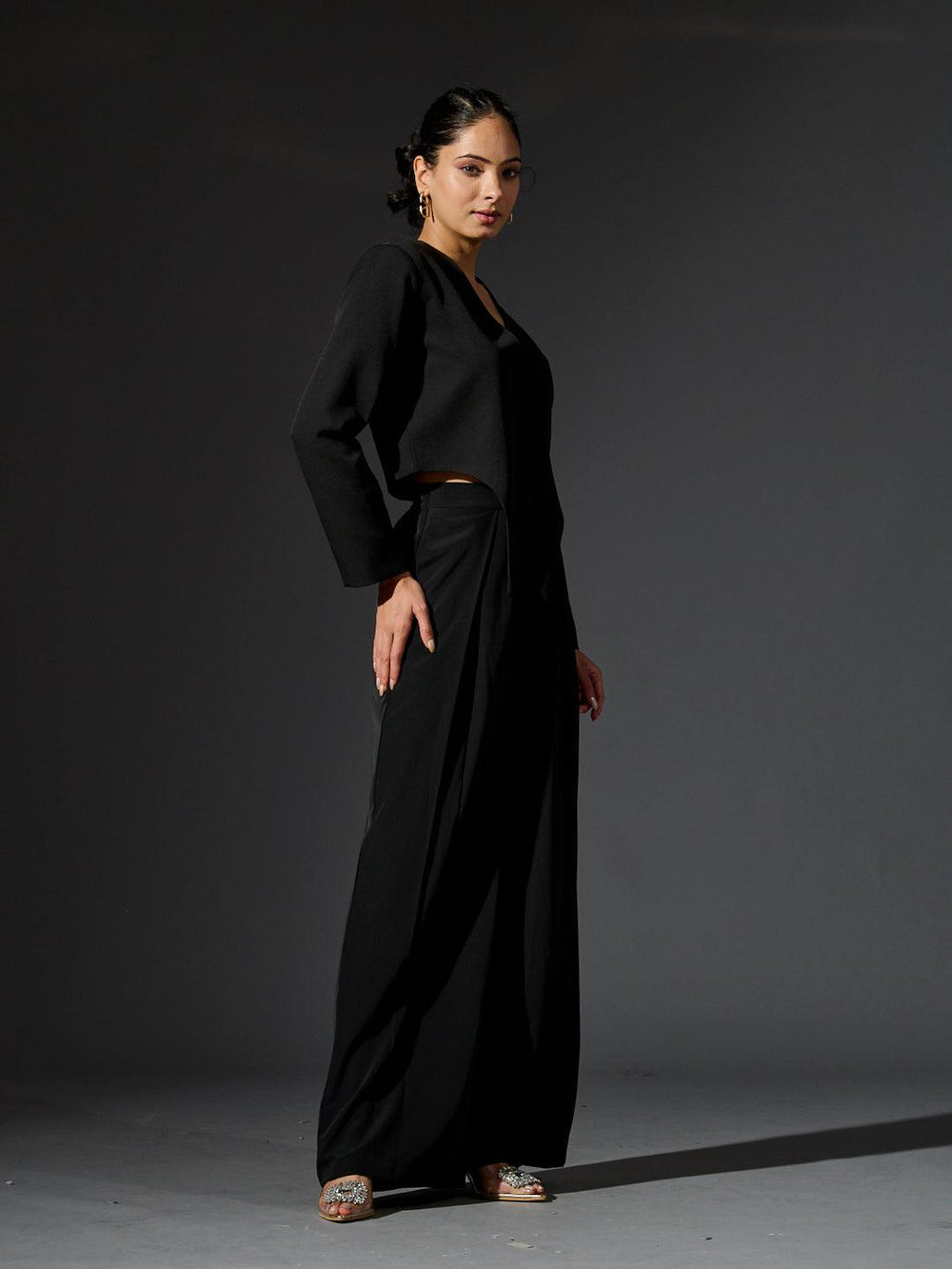 Risate women's full sleeves waistcoat set in black featuring a stylish cropped jacket and wide-leg pants