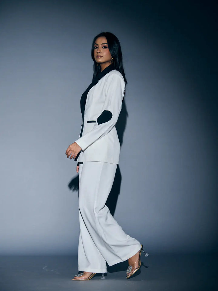 Risate women's heart patch pant suit in white with stylish design and chic silhouette